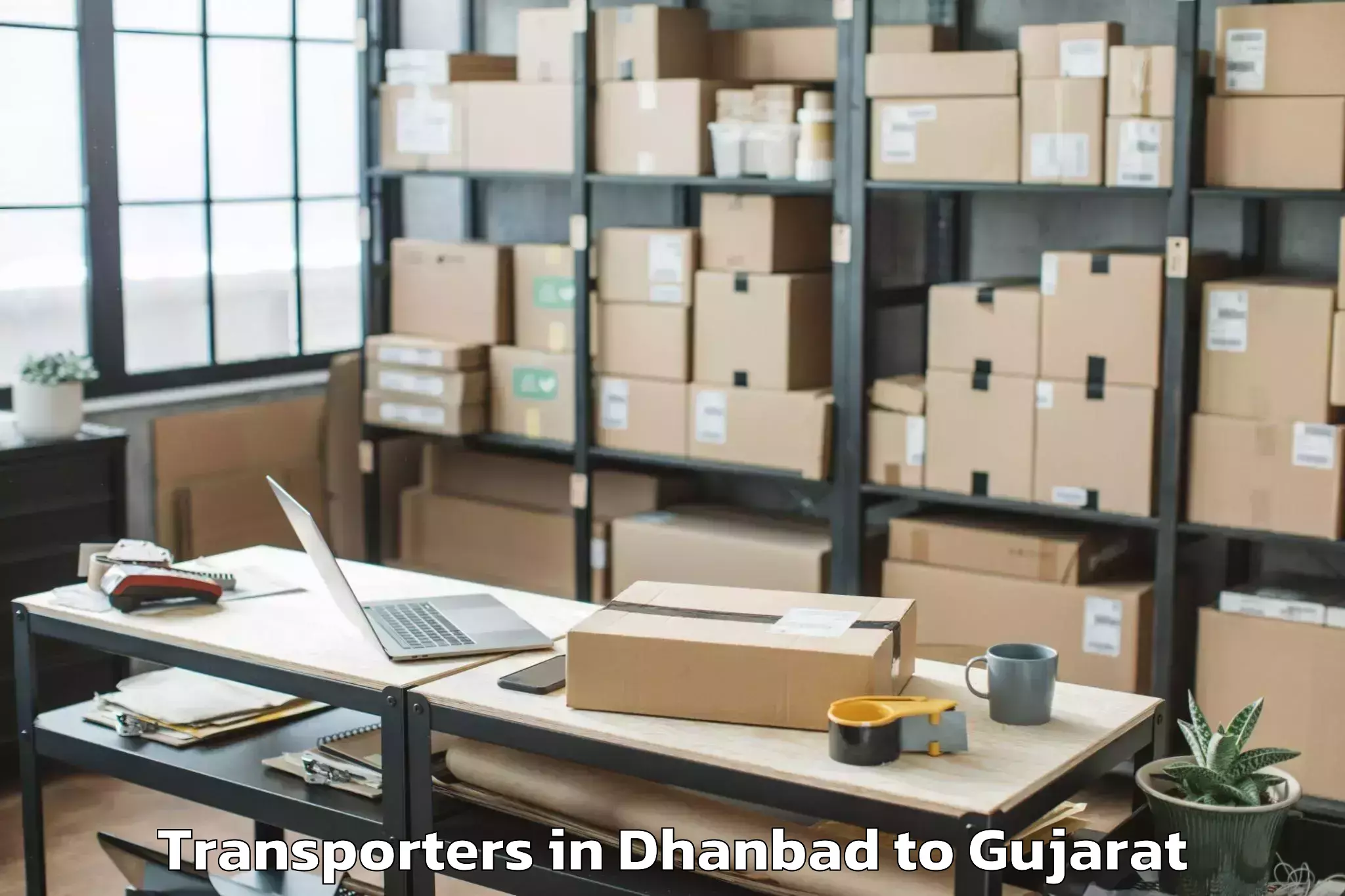 Get Dhanbad to Umarpada Transporters